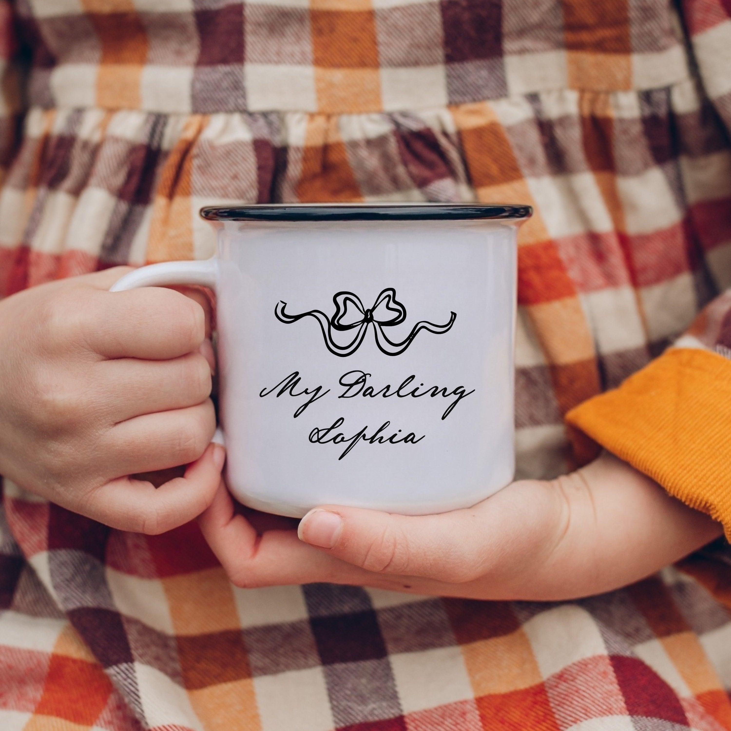 child holding personalised mug